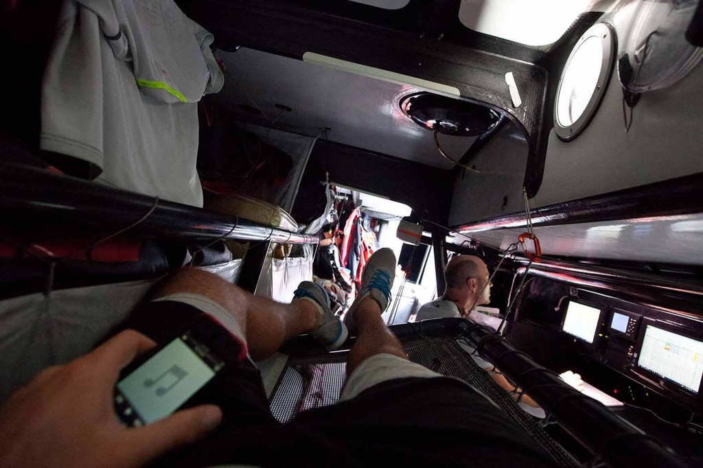 Off-watch downtime: too hot to sleep, time to shed some layers and break out the tunes. PUMA Ocean Racing powered by BERG during leg 3 of the Volvo Ocean Race 2011-12 © Amory Ross/Puma Ocean Racing/Volvo Ocean Race http://www.puma.com/sailing
